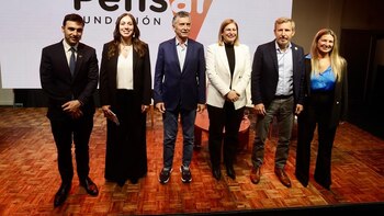 Mauricio Macri junto a dirigente