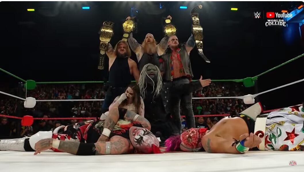 A sexta equipes do WYATT chegou ao mundo colidir para atacar o cônjuge da AAA.