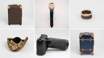 Maleta Louis Vuitton, reloj Piaget Altiplano, anillo dorado y negro Bulgari, sombrero mexicano en color negro, cámara YASHICA Dental-Eye II y maleta Chariot (Viasubasta)