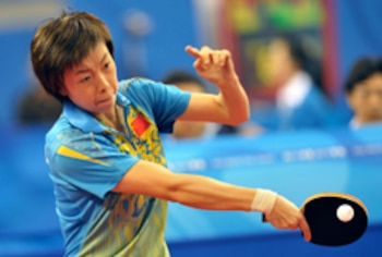 China's Zhang Yining (L) plays