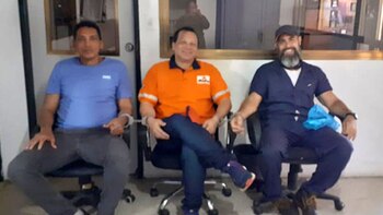 EN RETENCIÓN: Herrera (centro) esposado