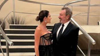 Pamela David junto a su