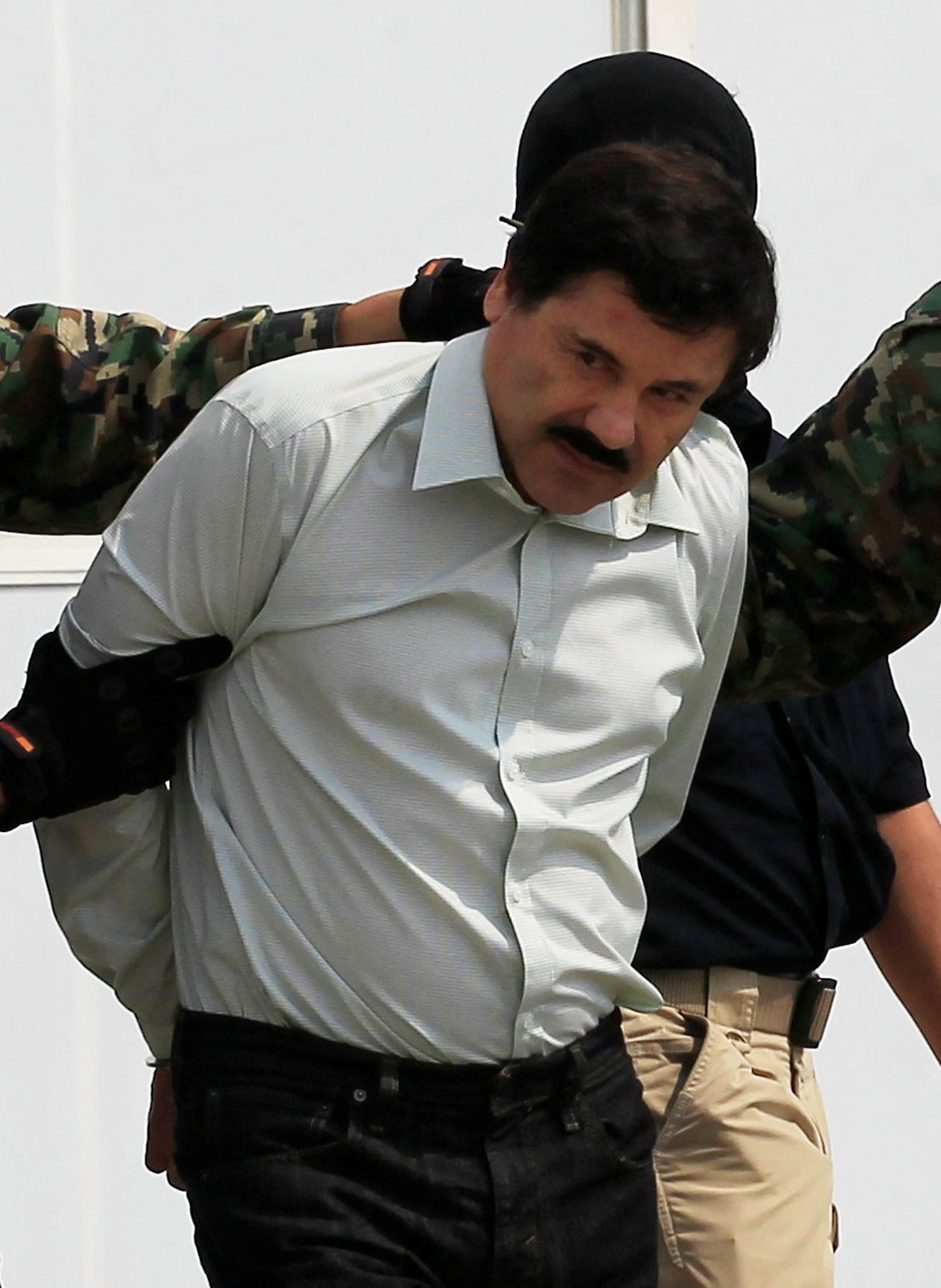 El Chapo, detenido en 2014. To match Special Report MEXICO-DRUGS/CHAPITOS REUTERS/Henry Romero/File Photo