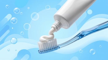Tubo blanco de pasta dental que deposita pasta sobre un cepillo de dientes azul con cerdas blancas, sobre un fondo celeste con burbujas.