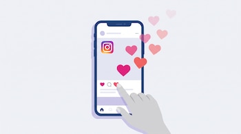 Teléfono móvil inteligente con el logo de Instagram y corazones rosados que salen de la pantalla mientras una mano toca la opción me gusta.