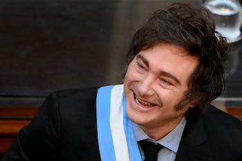 Argentina's President Javier Milei smiles