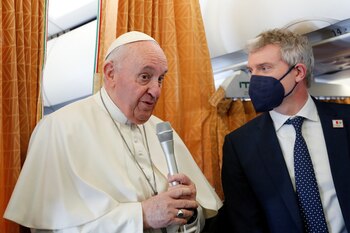 Pope Francis speaks aboard the