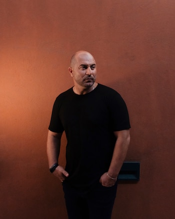 FILE — Lior Raz, the star and co-creator of “Fauda,” the hit Netflix series about a team of Israeli undercover anti-terrorist operatives, in Tel Aviv, Aug. 1, 2021. The new season of “Fauda” depicts the Hamas attacks and aftermath. It arrives as Israel’s artists face resistance overseas precisely because of how the country responded to Oct. 7. (Amit Elkayam/The New York Times)