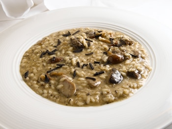 Arroz caldoso de pollo y