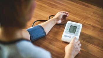 Woman using medical device to