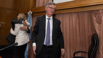 El fiscal Eduardo Taiano, atrás