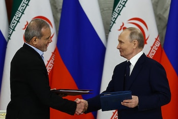 Russian President Vladimir Putin and Iranian President Masoud Pezeshkian attend a documents signing ceremony in Moscow, Russia January 17, 2025. REUTERS/Evgenia Novozhenina/Pool