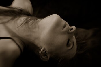 young female with closed eyes