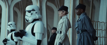 (Second from Left - R)