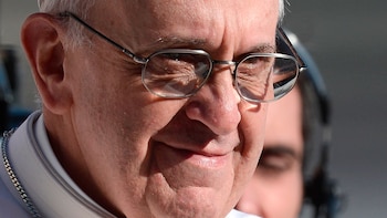 zzzzinte1Pope Francis smiles during his