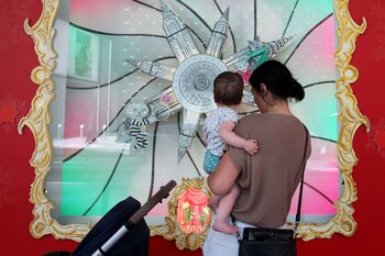 A woman and child look