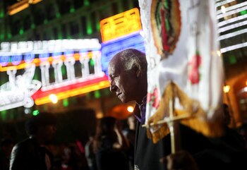 A man dressed as priest