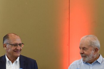 Brazil’s former President Luiz Inacio Lula da Silva looks at Sao Paulo's former governor Geraldo Alckmin during an event for Alckmin’s indication as his Vice President for national elections in Sao Paulo, Brazil April 8, 2022. REUTERS/Carla Carniel