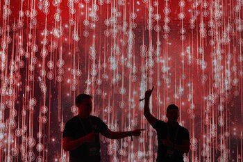 Bitcoin enthusiasts pose for pictures