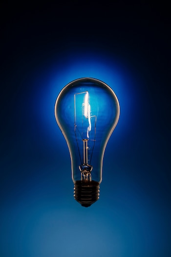 BC-HBRNI-1100-JUNIOR-EMPLOYEES-AI-ART-NYTSF — An incandescent bulb, in Newburgh, N.Y., on Aug. 1, 2023. Entry-level employees are on the front lines of a rapid shift in knowledge work. (Tony Cenicola/The New York Times) — ONLY FOR USE WITH ARTICLE SLUGGED — BC-HBRNI-1100-JUNIOR-EMPLOYEES-AI-ART-NYTSF— OTHER USE PROHIBITED