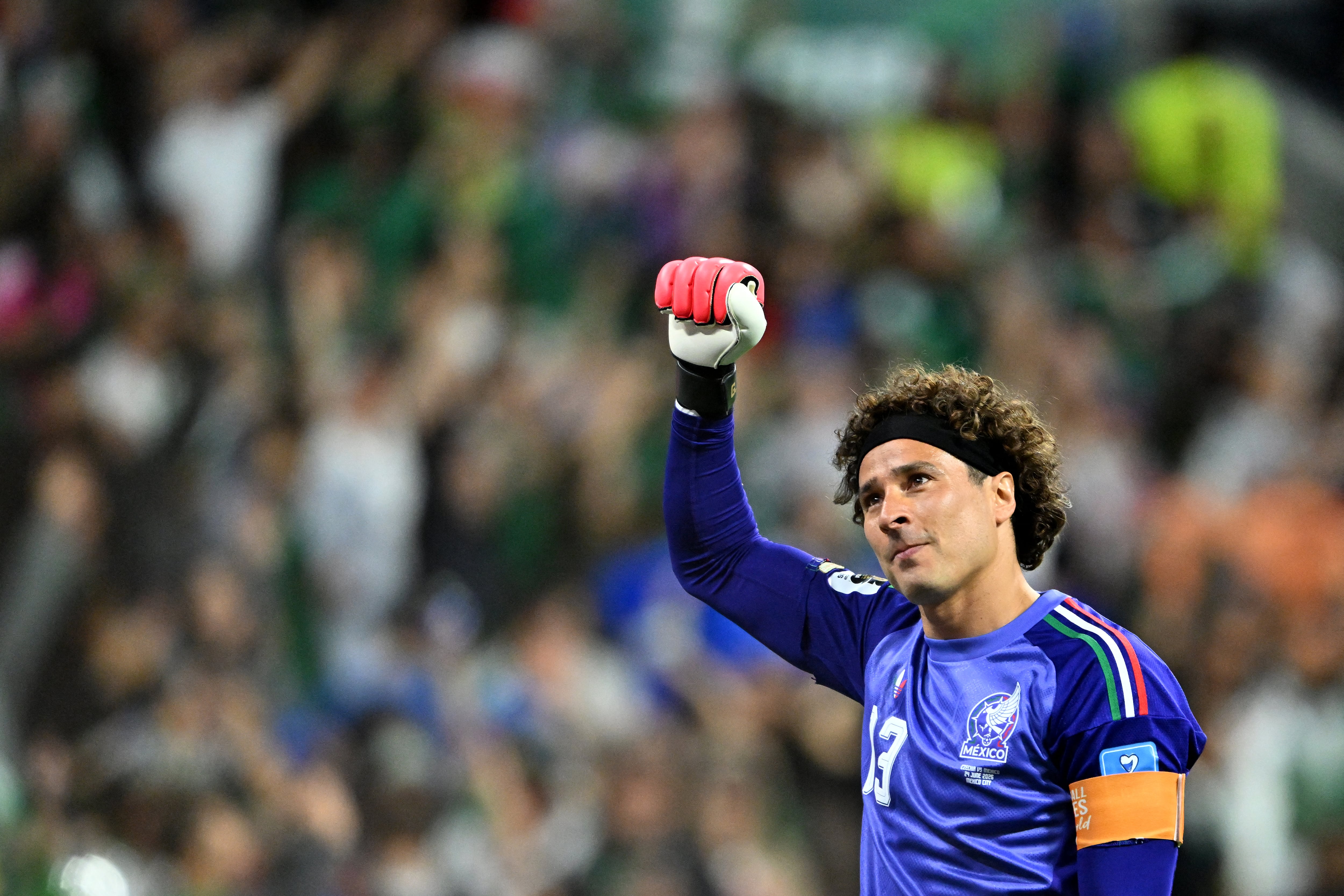 Mexico's goalkeeper #13 Guillermo Ochoa celebrates after winning the 2026 World Cup Group A football match between the Czech Republic and Mexico at the Mexico City Stadium in Mexico City on June 24, 2026. (Photo by CARL DE SOUZA / AFP)