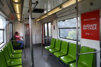 A passenger wears a protective