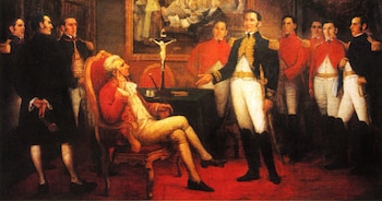 Pintura con múltiples figuras masculinas en uniformes militares. Un hombre está sentado en un sillón, otro de pie gesticula. Hay una mesa, un crucifijo y un cuadro