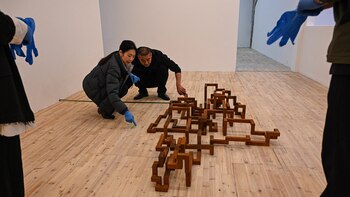 Empleados de la galería china