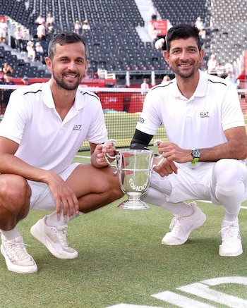 Marcelo Arévalo y Mate Pavić ganaron el HSBC Championships de Queen's Club tras vencer a Harri Heliövaara y Henry Patten por 6-2 y 6-4 en la final. (Foto: Federación Salvadoreña de Tenis)
