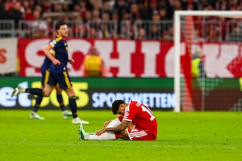 MUNICH (Germany), 21/10/2026.- Luis Diaz of Munich is injured on the ground during the UEFA Champions League league phase match FC Bayern Munich against Arsenal FC, in Munich, Germany, 21 October 2026. (Liga de Campeones, Alemania) EFE/EPA/ANNA SZILAGYI