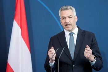 Austrian Chancellor Karl Nehammer attends