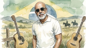Un hombre con gafas de sol y barba blanca está junto a dos guitarras en un campo con la bandera de Brasil al fondo.