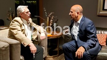 Alberto Fernández y su anfitrión,