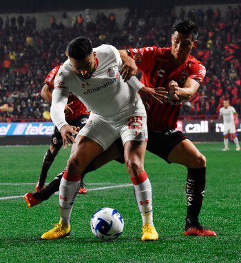 Los jugadores Angel Sepulveda (atrás)