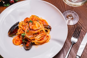 Receta de pasta con mejillones, un clásico de la cocina italiana (Magnific)