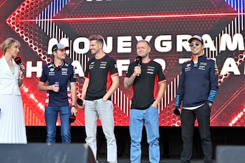 Oct 19, 2024; Austin, Texas, USA; from left, sports broadcaster Laurette Nicoll interviews Oracle Red Bull Racing driver Max Verstappen of Team Netherlands and Moneygram Haas F1 Team driver Nico Hulkenberg of Team Germany and Moneygram Haas F1 Team driver Kevin Magnussen of Team Denmark and Oracle Red Bull Racing driver Sergio Perez of Team Mexico during a fan forum before the Sprint Race in the 2024 Formula One US Grand Prix at Circuit of the Americas. Mandatory Credit: Jerome Miron-Imagn Images