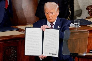 U.S. President Donald Trump holds
