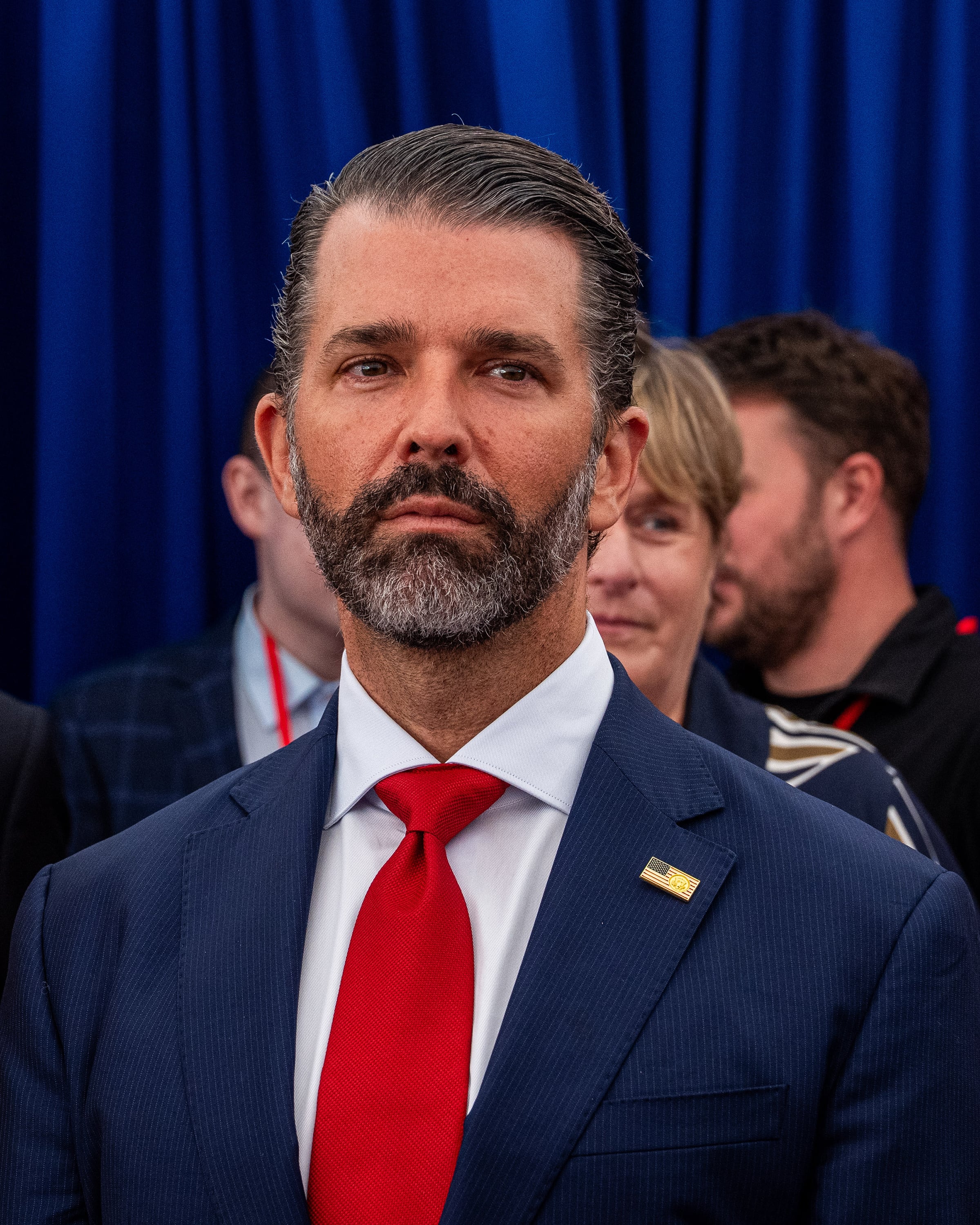 Donald Trump Jr. listens as his father, President Donald Trump, speaks at the Deerfield Residence in Dublin, Sept. 12, 2026. A Russian businessman with ties to the Kremlin paid hundreds of thousands of dollars to help finance Donald Trump Jr.Õs wedding after-party in the Bahamas this year, according to two people with knowledge of the matter. (Alex Kent/The New York Times)