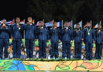 Gold medallists Fiji celebrate on