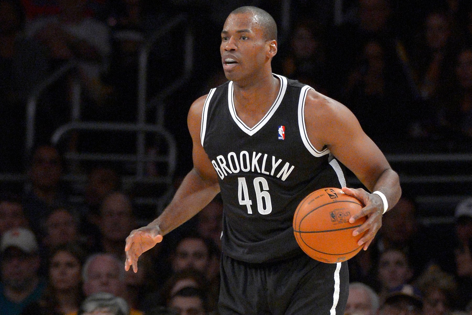 Jason Collins con la camiseta de Brooklyn Nets en 2014, tras su etapa en la NBA (AP Foto/Mark J. Terrill)