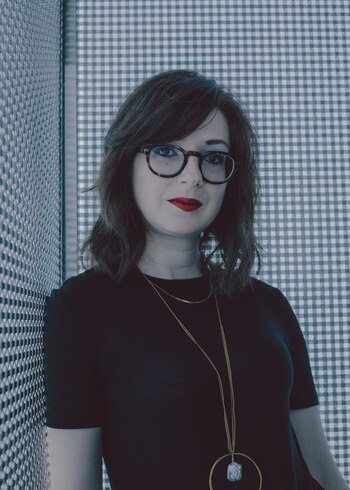 FILE -- Liz O'Sullivan stands for a portrait in New York on July 11, 2019. O’Sullivan, now the chief executive of the start-up Parity, said it had been a challenge to persuade some in the industry to be more concerned about bias in artificial intelligence. (Nathan Bajar/The New York Times)