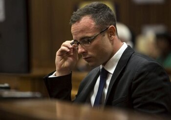 PRETORIA, SOUTH AFRICA - MARCH 17: (SOUTH AFRICA OUT) Oscar Pistorius at the Pretoria High Court on March 17, 2014, in Pretoria, South Africa. Oscar Pistorius, stands accused of the murder of his girlfriend, Reeva Steenkamp, on February 14, 2014. This is Pistorius' official trial, the result of which will determine the paralympian athlete's fate. (Photo by Daniel Born/Foto24/The Times - Pool/Getty Images)