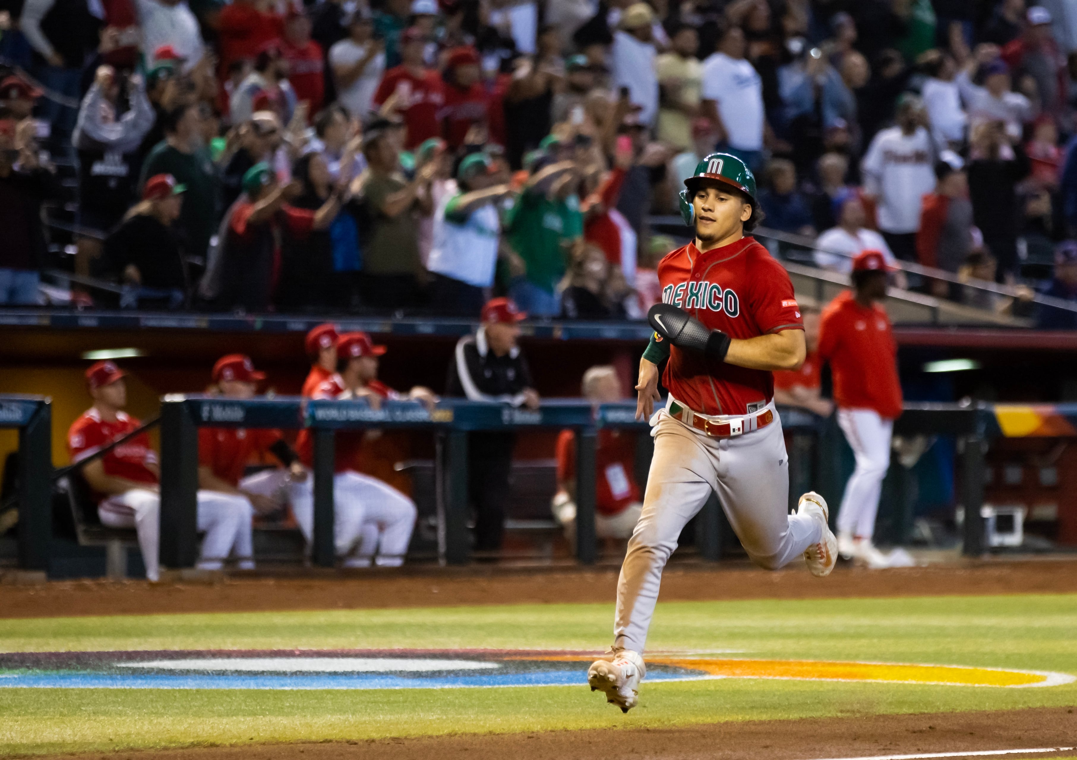 Mar 15, 2023; Phoenix, Arizona, USA; Mexico outfielder Alek Thomas scores in the sixth inning against Canada during the World Baseball Classic at Chase Field. Mandatory Credit: Mark J. Rebilas-USA TODAY Sports