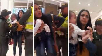 Mujer sacada de tienda en