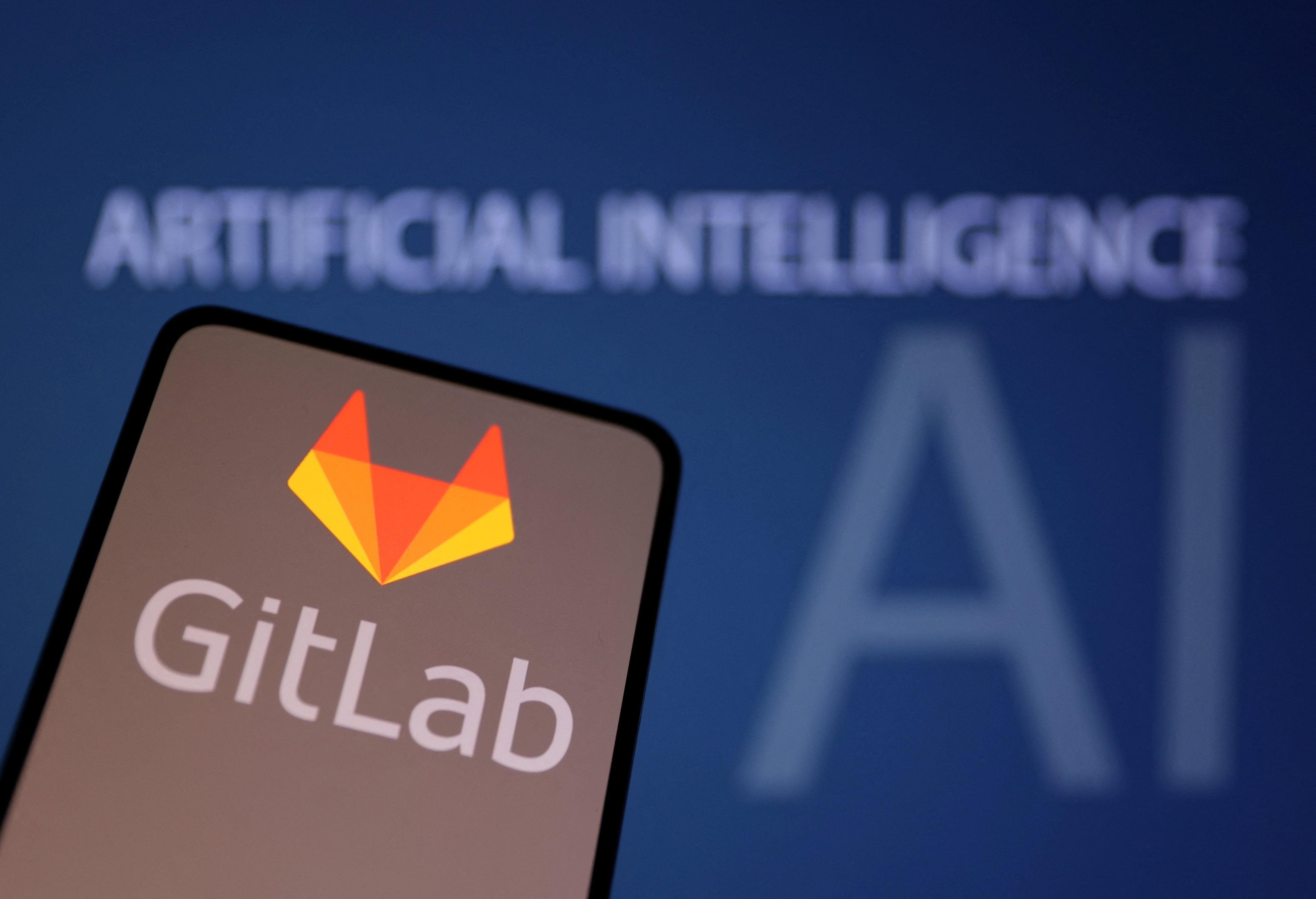 GitLab Inc logo and words 'Artificial Intelligence' are seen in this illustration taken June 6, 2023. REUTERS/Dado Ruvic/Illustration