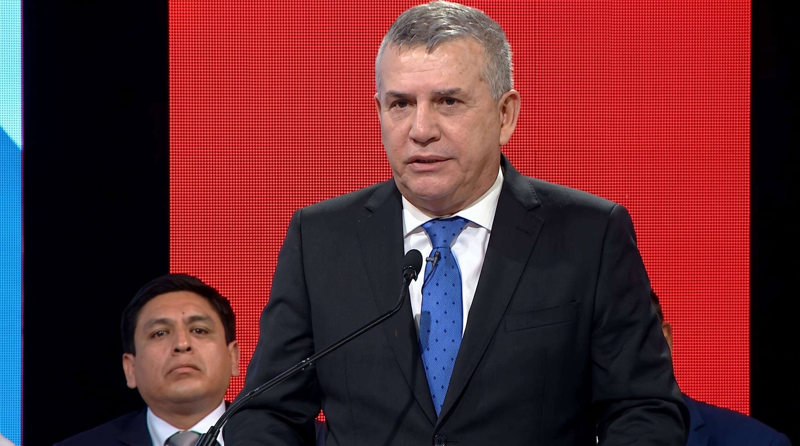 Daniel Urresti centró su mensaje en el debate municipal 2026 del JNE en la lucha contra la delincuencia en Lima. (Crédito: Captura video/JNE) (Imagen Ilustrativa Infobae)