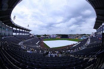 May 11, 2025; Tampa, Florida, USA; a tarp lines the infield before a game between the Tampa Bay Rays and the Milwaukee Brewers at George M. Steinbrenner Field. Mandatory Credit: Nathan Ray Seebeck-Imagn Images