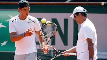 Rafa Nadal junto a su
