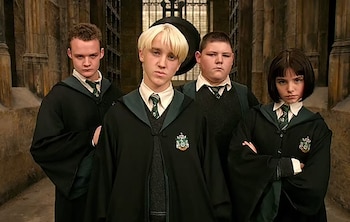 Jamie Waylett junto a Tom