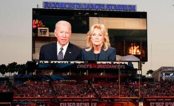 Fans watch a broadcast of